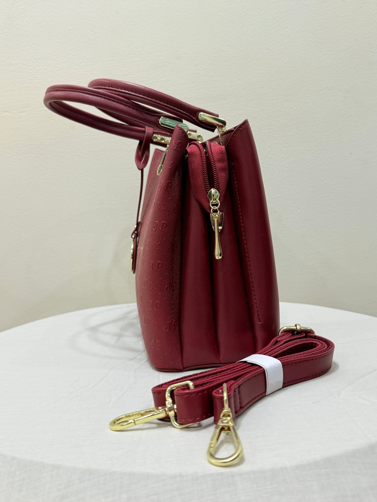 Burgundy Wine Handbag with Embossed Pattern & Gold Charm - Luxury Style Women's Bags