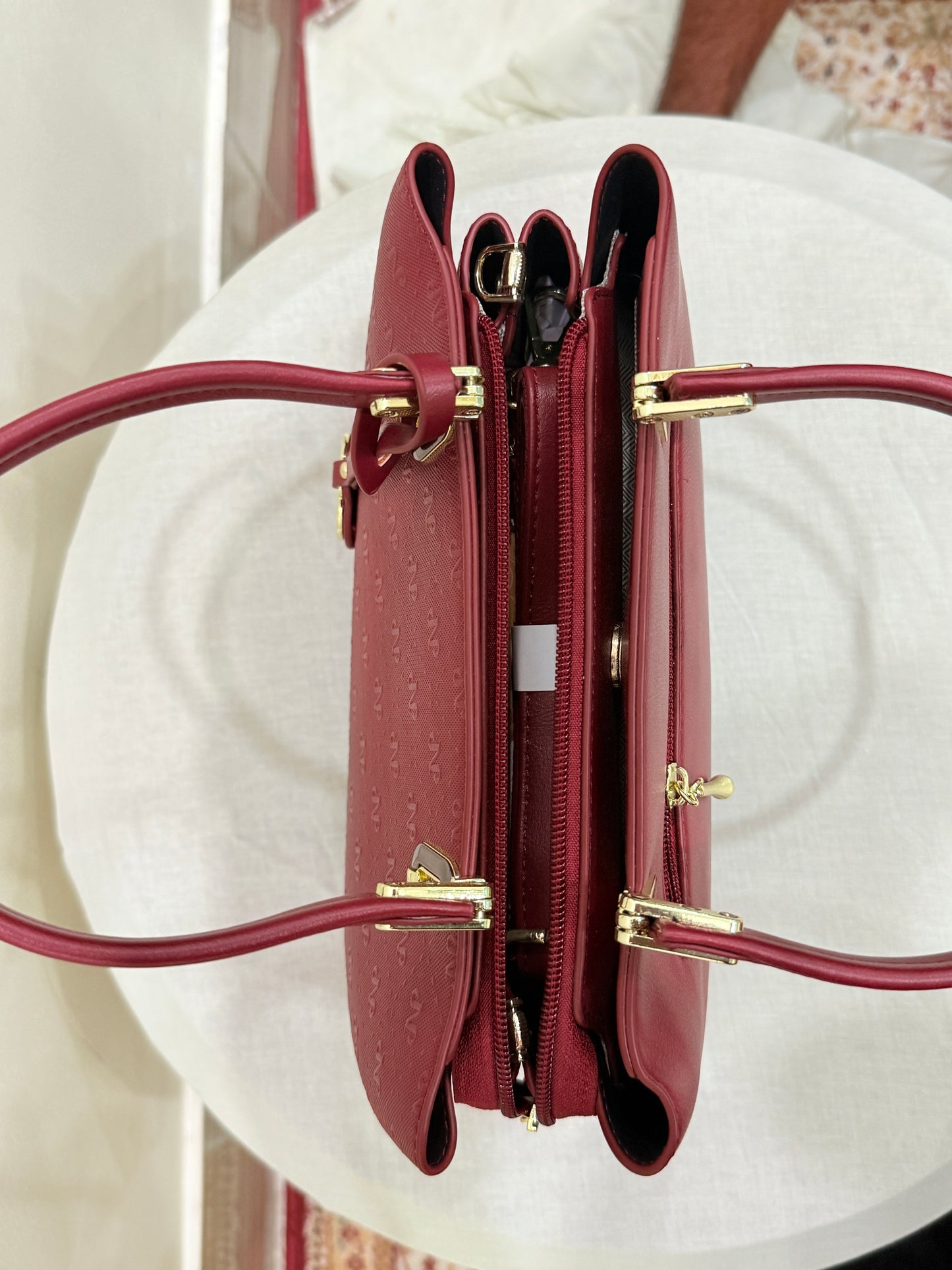 Burgundy Wine Handbag with Embossed Pattern & Gold Charm - Luxury Style Women's Bags